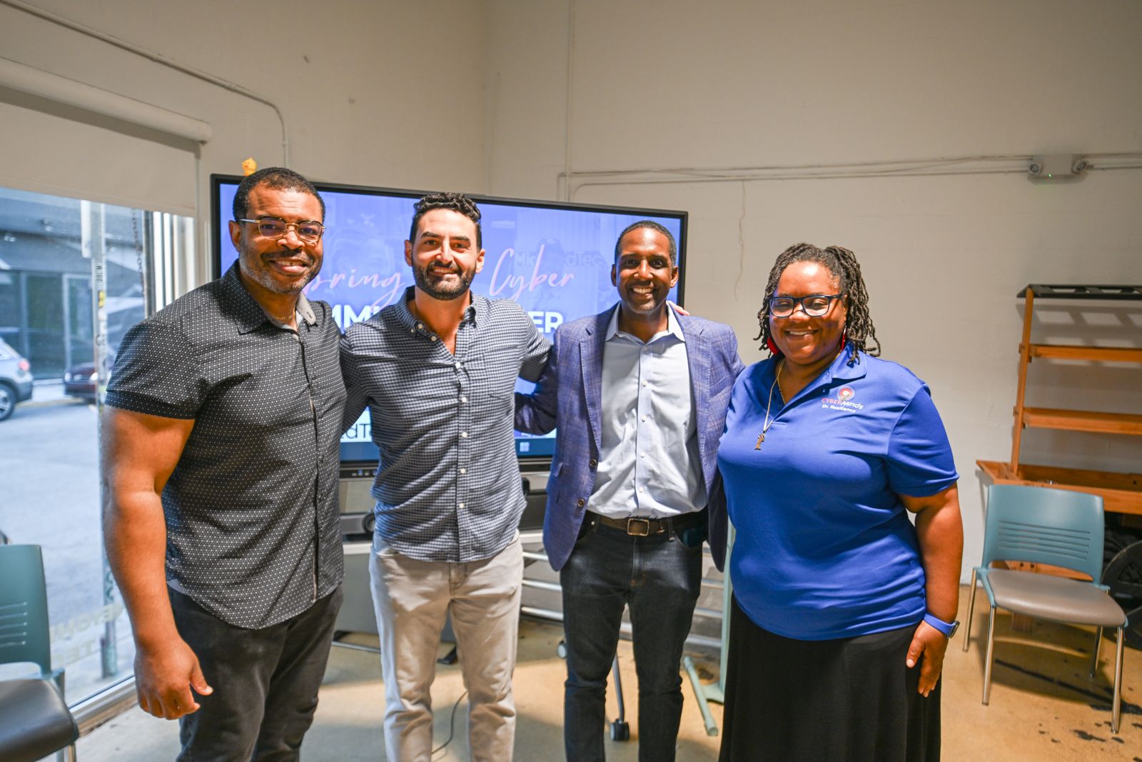 Project SECURE mentors and partners posing together at a Miami EdTech cyber event